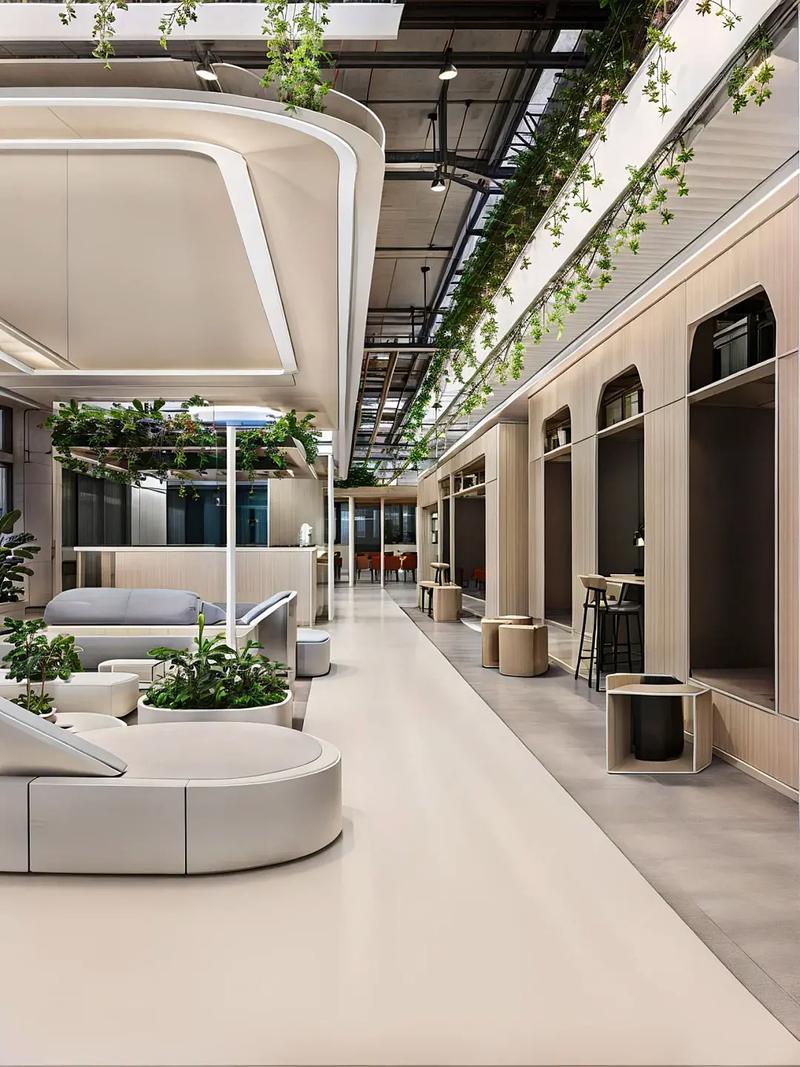 綠意盎然的辦公室裝修設(shè)計(jì)效果圖案例 融合生態(tài)與現(xiàn)代的辦公空間設(shè)計(jì)
